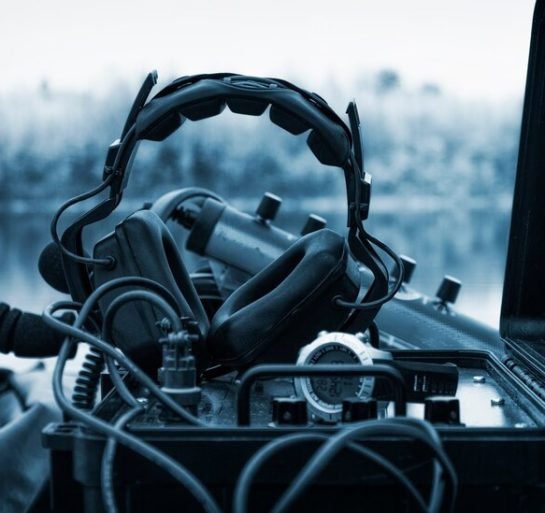 headphones-are-radio-station-concept-political-instability-radio-broadcasts-tamahawks-guidance_392761-416